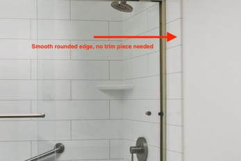 A remodeled shower with bp-cor2 with a smooth rounded edge connecting to the bathroom wall