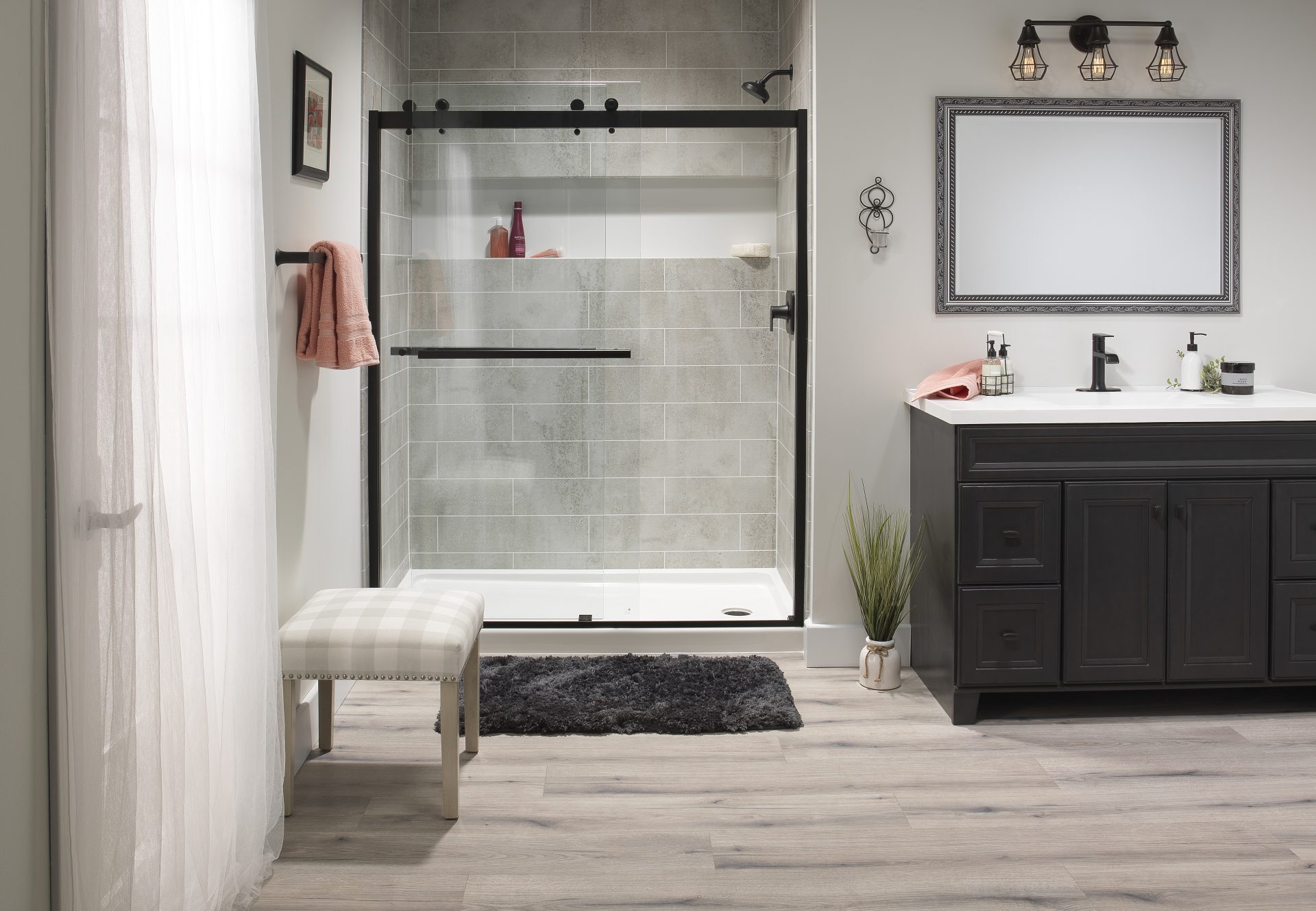 Inside a bathroom with a newly installed walk-in shower