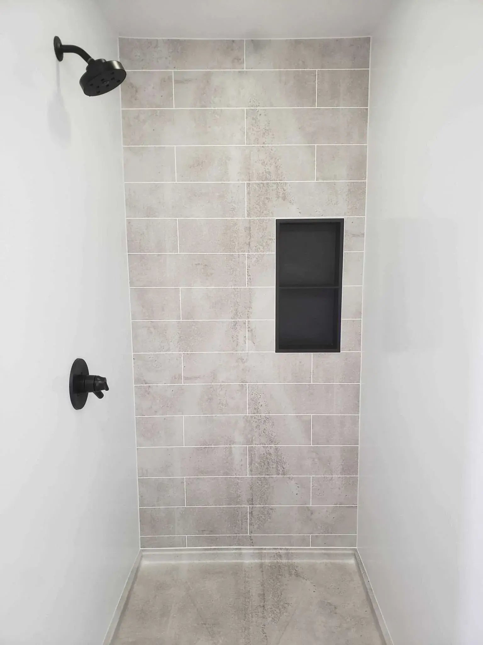 Shugarmans-Bath-Grey-Bath-Planet-subway-pattern-shower-wall-surround-walk-in-shower-low-barrier-entry-double-niche-shelving-matte-black-hardware-Santee-Ca-1536x2048