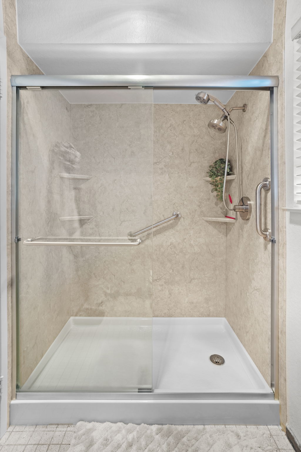 Shower Remodel with Brecchia Patterned Walls