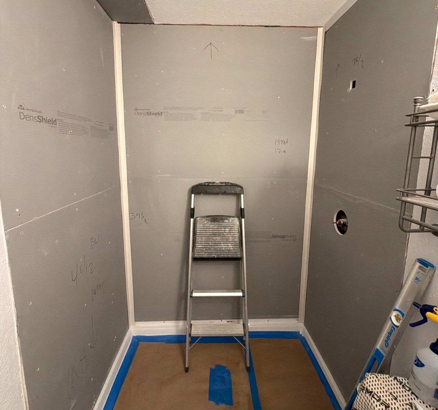 A fully waterproofed shower area before the surface walls are put on.