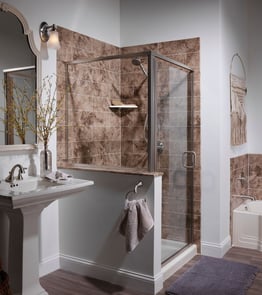 A walk-in shower with madeira walls